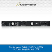 Studiomaster DQX2-1300 power amplifier on a white background with Studiomaster logo.
