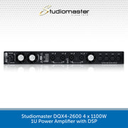 Studiomaster DQX4-2600 power amplifier on a white background with Studiomaster logo.