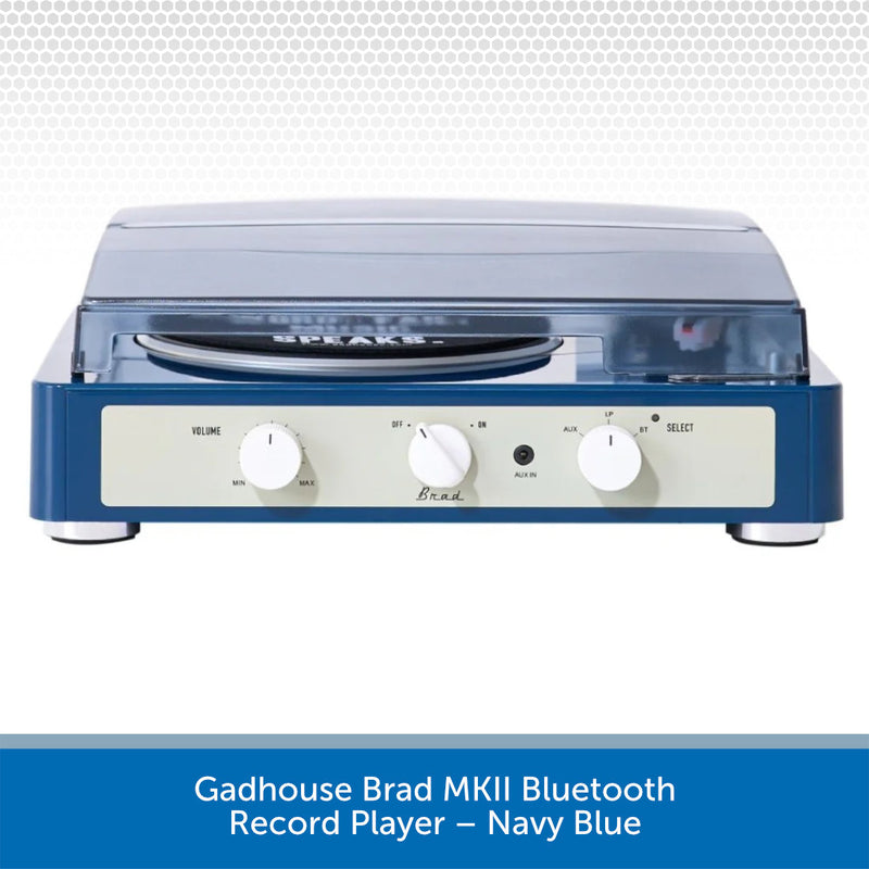 Navy blue record player with white control knobs on a light gray background