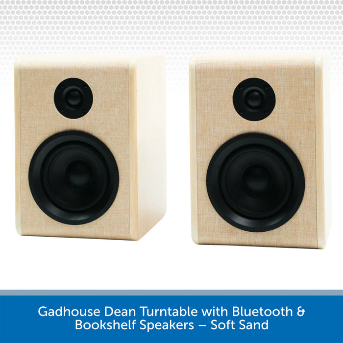 Pair of bookshelf speakers with soft sand finish on a white background