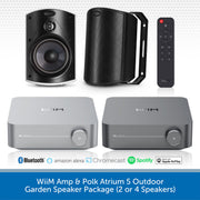 WiiM Amp & Polk Atrium 5 Outdoor Garden Speaker Package, featuring two silver receiver boxes, one black speaker, one black speaker enclosure, and a black remote control, with compatibility logos for Bluetooth, Amazon Alexa, Chromecast, Spotify, and Apple AirPlay on a white background with a blue banner at the bottom.