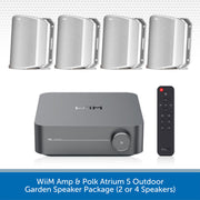 WiiM Amp and Polk Atrium 5 outdoor garden speaker package, featuring a central dark gray amplifier, four silver outdoor speaker enclosures, and a black remote control, with text at the bottom indicating the package includes 2 or 4 speakers.